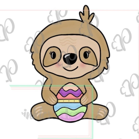 Whimsy Sloth holding an Egg Cookie Cutter - Periwinkles Cutters
